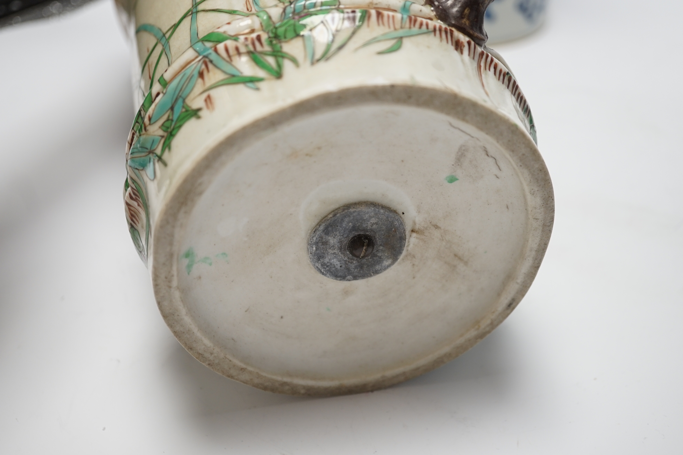 A pair of Chinese blue and white cylindrical hat stands, 29cm high and a Japanese porcelain vase modelled as bamboo